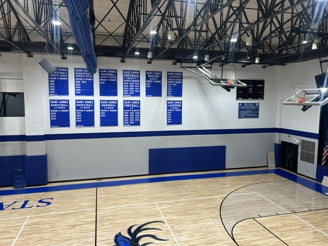 New championship banners celebrating St. Agnes teams