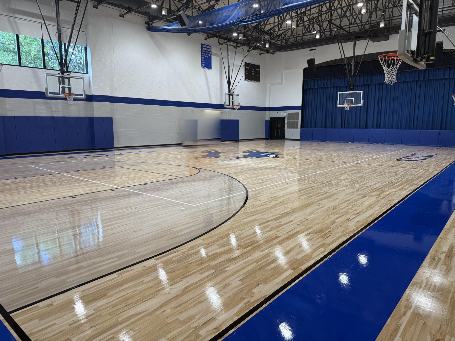 The newly refinished Thomas Patrick Hall basketball court